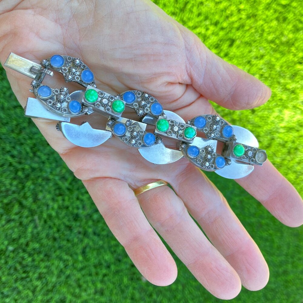 Antique or vintage silver bracelet with light blue and green stones.